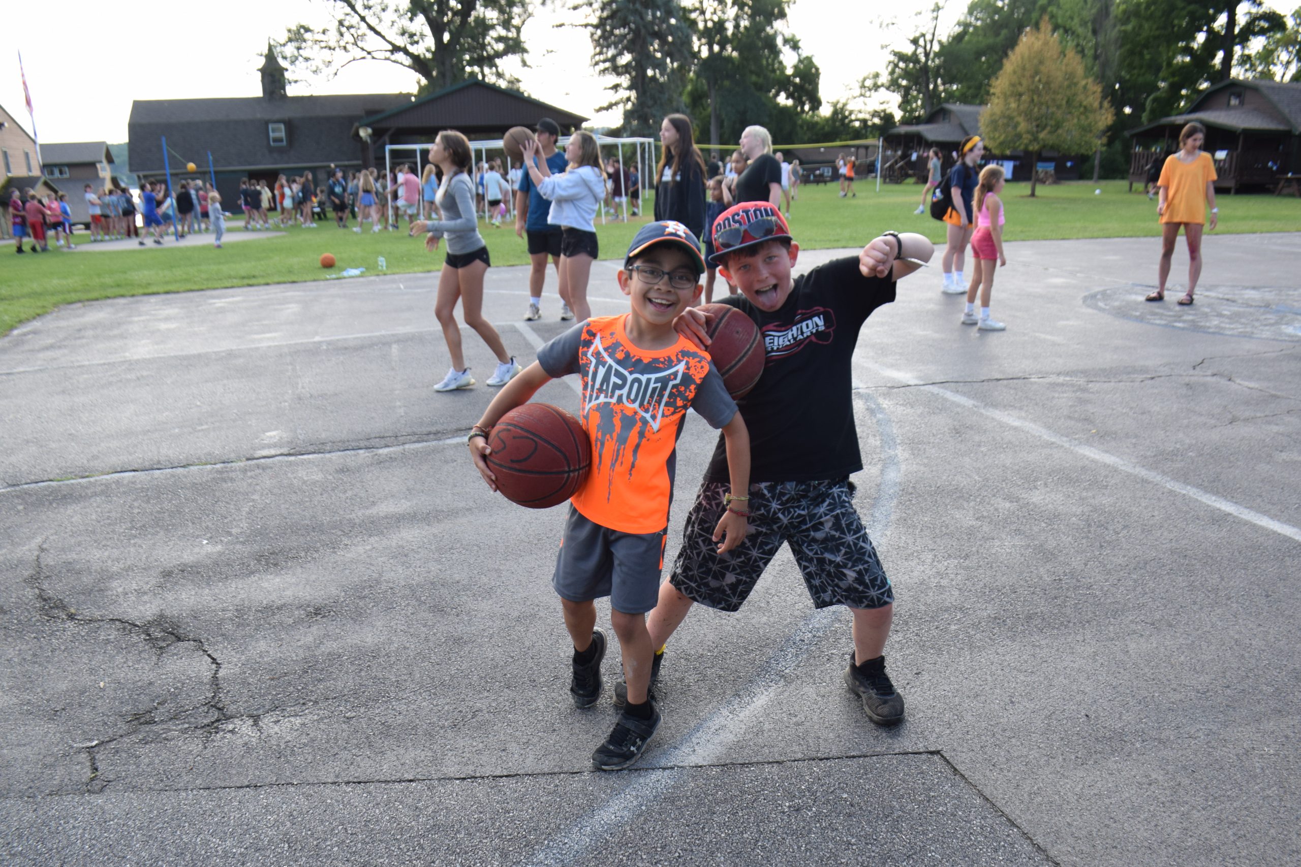 two boys with a basketball