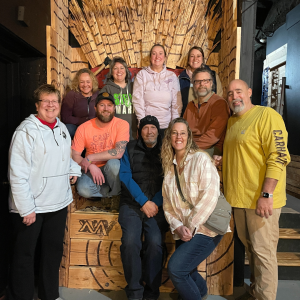 Group of adults posing for a picture
